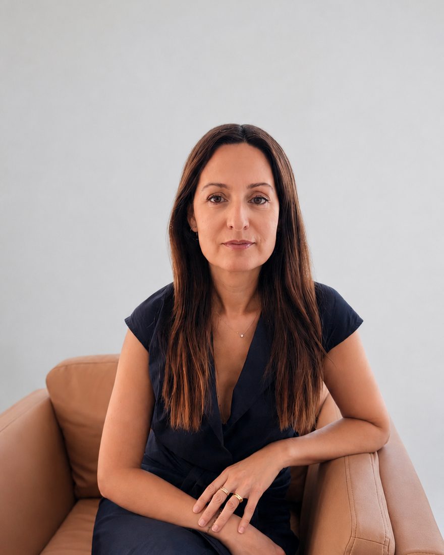 Marta Horrach, therapist, seated in an armchair